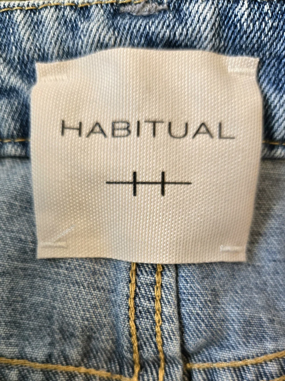Habitual Studded Raw Hem Light Wash Denim Mini Skirt